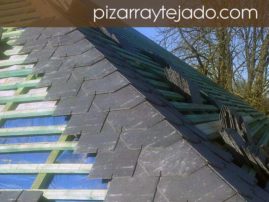 Detalle de doble rastrel y limatesa con pizarra natural de León. Tejado de 500 m2 en Europa.
