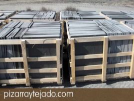 Plaquetas de pizarra natural para decorar revestimientos. Acabado rústico (sin calibrar) para exteriores. Cantera en León.