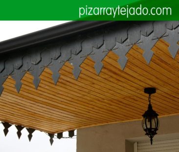 Teulada de pissarra. Remate de alero tejado de pizarra. Pissarra per cobertes, teulades i façanes. Venta y colocación de pizarra de León.