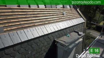 Colocación de detalle de pizarra en tejado en Flandes. Tejado pizarra detalle.
