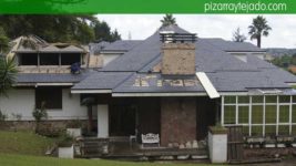 Aislamiento térmico, doble rastrel de madera tratada y pizarra especial para costa. Pizarra Oviedo.