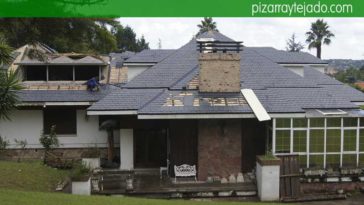 Aislamiento térmico, doble rastrel de madera tratada y pizarra especial para costa. Pizarra Oviedo.